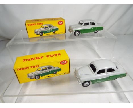 Dinky - two Vauxhall Cresta Saloon cars # 164 both comprising grey upper body and green lower, with grey ridged hubs and blac