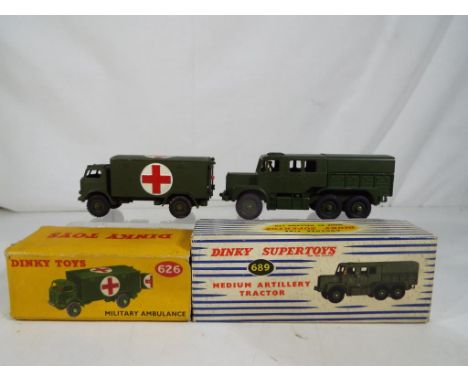 Dinky Toys - A Dinky Toys # 626 Military Ambulance in green with red and white cross contained in original card box and Dinky