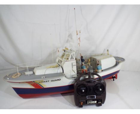 R/C Boats - Battery operated plastic coastguard boats, appears to be kit built, approximate height 50 cm, 75 cm (l), 20 cm (w