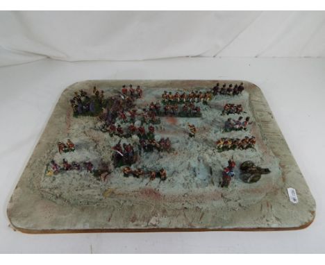 Model Soldiers - a diorama consisting of hand painted metal figures comprising Cavalry, Infantry, Artillery and similar, some