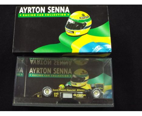 Die cast - a 1:43 scale Ayrton Senna Lotus 97 T-Renault Turbo 1985 F1 racing car by the Racing Car Collection in mint conditi