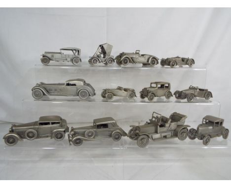 Danbury Mint - twelve pewter cars approximately 1:43 scale comprising 1934 Austin 7, 1909 Rolls Royce, 1931 Daimler 66 and si