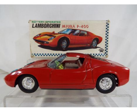 Asakusa - Very rare 1960's Japanese tinplate battery operated P400 Lamborghini Miura in original box, with operating headligh
