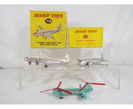 Dinky Toys - Three Dinky Toys diecast model aircraft comprising # 705 Viking, silver body with twin red propellers (unboxed),