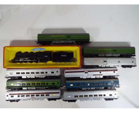 Model Railways - a rare 4-6-2 Tri-ang OO gauge Hiawatha class steam locomotive in original box, lid lacking and nine unboxed 