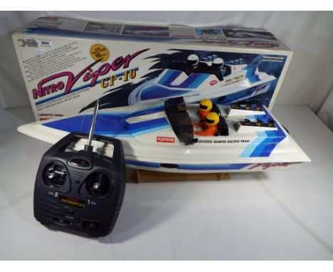 R/C Boats - Kyosho Nitro Viper GP-10 Speedboat with nitro motor fitted in original box. Est £60 - £80