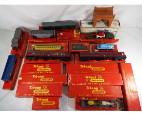 Model Railways - in excess of 20 Tri-ang OO gauge coaches and wagons in original boxes, items E to NM and boxes E  please see