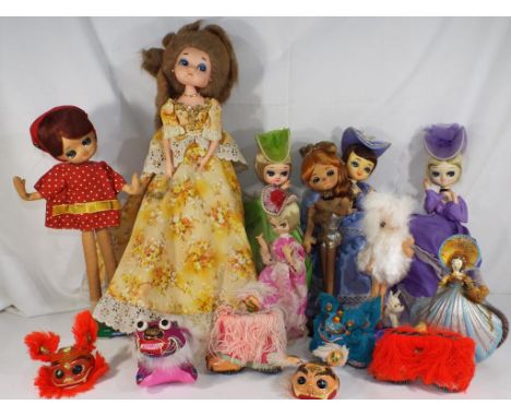 Vintage dolls - four dolls appear to the style of Bradley, lot also includes a shell doll and others, size varies from 22 cm 
