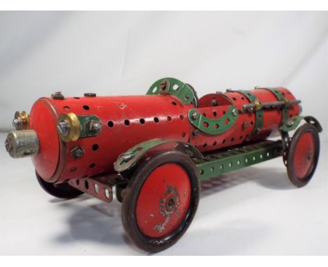 A vintage Meccano racing car. Estimate £70 - £90