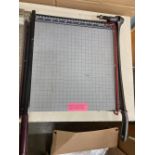 paper cutters and 3 hole puncher