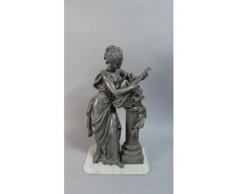 A Spelter Study of a Classical Maiden Playing Lute, 37cm High 