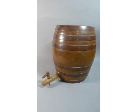 A Treacle Glazed Ceramic Barrel with Wooden Tap, 37cm high 