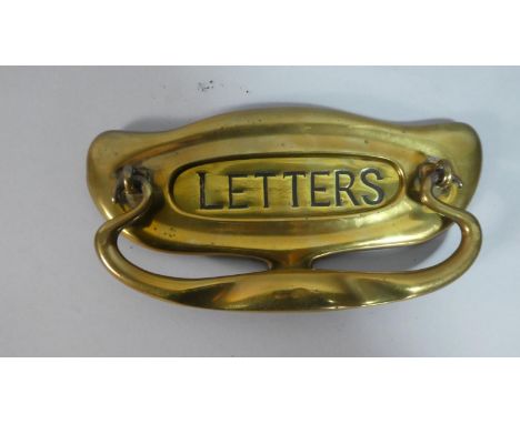 An Art Nouveau Brass Door Knocker and Letter Flap, 20cm Wide 