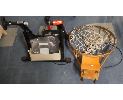 A Wall Fixing Basketball Ring and an Elite Bicycle Carrier 