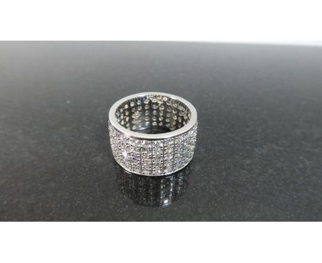 A Heavy Silver Dress Ring Stamped 925 with White Stones and Daisy Mark 