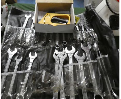 A Twenty-five Piece Metric Spanner Set and a Staple Gun 
