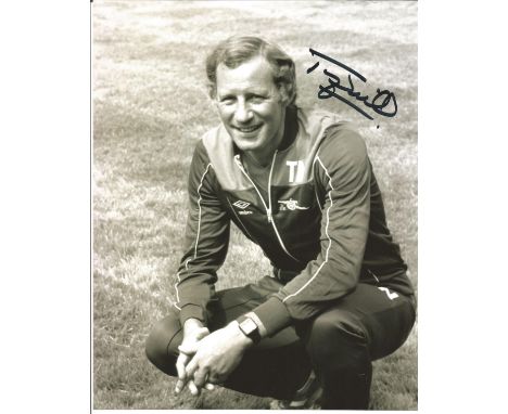 Terry Neil signed 10x8 b/w football photo picture while Manager at Arsenal.  Good Condition. All signed pieces come with a Ce