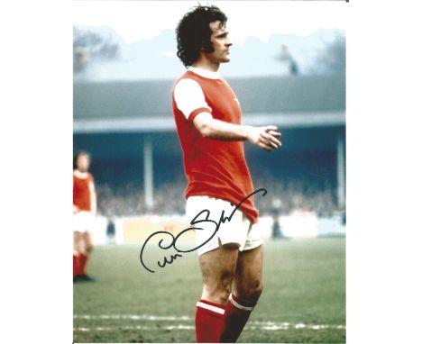 Peter Storey signed 10x8 colour football photo pictured in action for Arsenal.  Good Condition. All signed pieces come with a