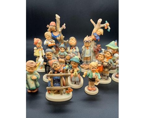 A selection of Goebel Hummel German porcelain figurines various dates and sizes (1948, 1975, 1938, 1955, 1957 etc)