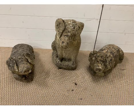 Three well weathered garden pigs 