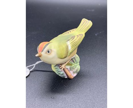 A Royal Worcester gold crest china bird (H6cm)