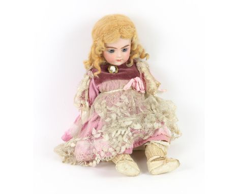 Bru Jne bisque head doll, blue glass fixed eyes and composition limbs, 40 cmsProvenance; private collection from a local dece