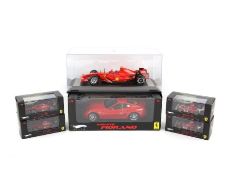 Five Mattel Elite 1:18 and 1:43 scale model Ferraris, comprising 599 GTB Fiorano, F1-90 Prost France GP 100th Ferrari victory