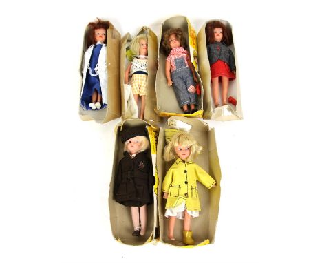 Six 1960s/70s vintage dolls - Patch the sister of Sindy in various out fits including School Outfit and wet weather gear, and