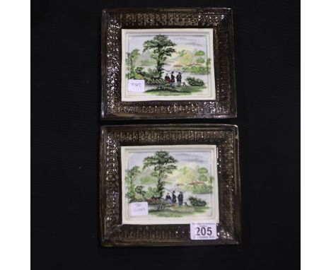 Two late 19th century hand painted ceramic wall plaques, 20 x 18 cm. One of the plaques has two chips to one corner. UK P&amp