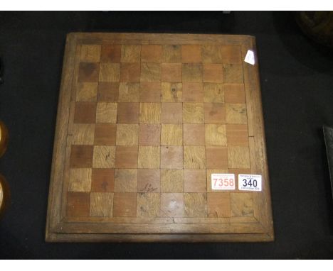 Antique chess/draught board with set of draughts pieces contained within, 39 x 39 cm. Not available for in-house P&amp;P