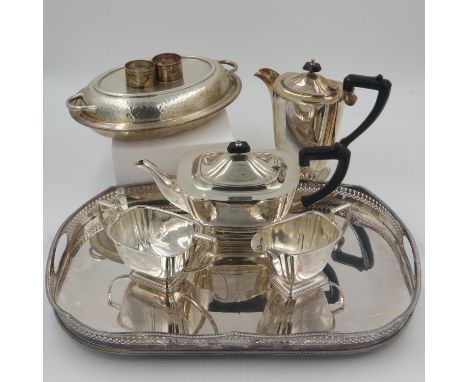 Silver plated galleried tray with a silver plated four piece tea service, covered serving dish with plannished design and nap