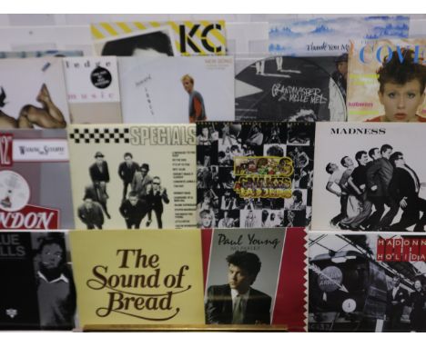 Fourteen vinyl albums mostly from the 1980s, Madness, Specials, Frankie Goes to Hollywood, plus a copy of issue one Hazel O'C