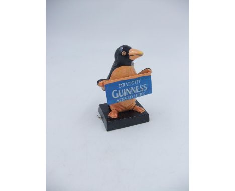 Cast Guinness penguin. H:12cm. UK P&amp;P Group 1 (£16+VAT for the first lot and £2+VAT for subsequent lots) 