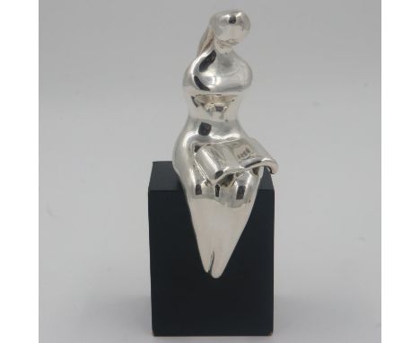 Devora Jaron seated model of a lady reading, believed to be filled silver, but unmarked, H: 20cm. UK P&amp;P Group 2 (£20+VAT