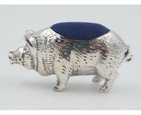 Silver pig-form pin cushion. UK P&amp;P Group 1 (£16+VAT for the first lot and £2+VAT for subsequent lots) 