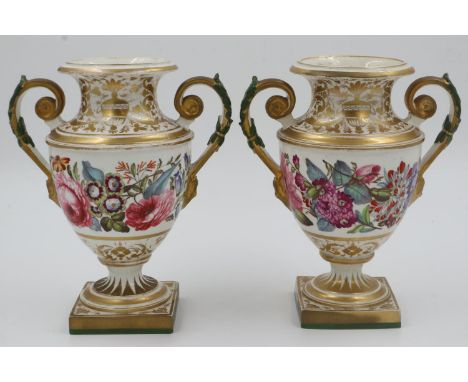 Two 19th Century Derby twin handled urn shaped vases with hand painted floral decoration, H: 22 cm, losses to gilt. UK P&amp;