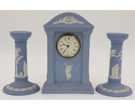 Wedgwood blue Jasperware mantel clock with a pair of candlesticks, height of tallest 22cm. UK P&amp;P Group 3 (£30+VAT for th