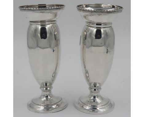 Pair of George V hallmarked silver vases, Birmingham assay 1929, H: 19cm, weighted bases. UK P&amp;P Group 2 (£20+VAT for the