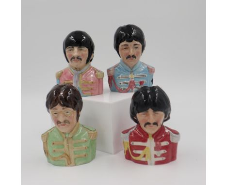 Set of four limited edition Beatles toby jugs. H 14cm. UK P&amp;P Group 2 (£20+VAT for the first lot and £4+VAT for subsequen