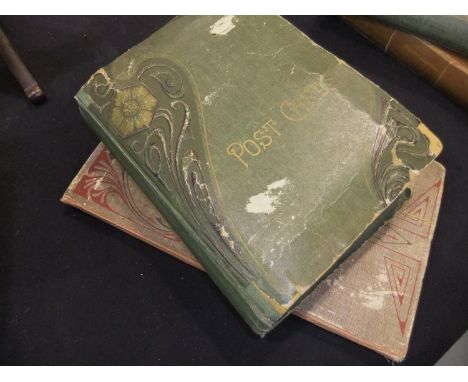 Two postcard albums with approximately 350 topographical and subject matter postcards. UK P&amp;P Group 1 (£16+VAT for the fi