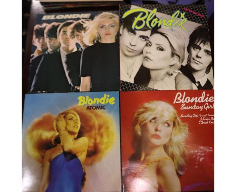 Four blondie LPs, Eat to the Beat, Blondie, Atomic and Sunday Girl, with a 1980 European Tour programme. UK P&amp;P Group 2 (