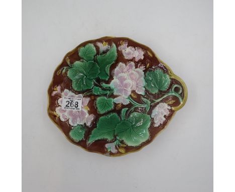 English 19th century majolica geranium pattern footed plate. UK P&amp;P Group 2 (£20+VAT for the first lot and £4+VAT for sub
