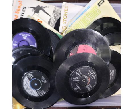 Collection of vinyl singles, including The Beatles, The Rolling Stones and Madness, many without sleeves. UK P&amp;P Group 2 
