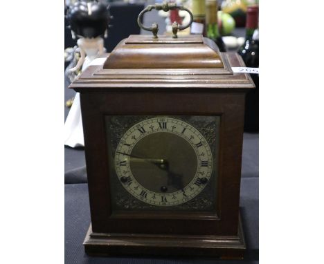 Mahogany mantel clock by Perivale, with Westminster chime and 1940 ICI inscription behind the door, runs then stops. Not avai