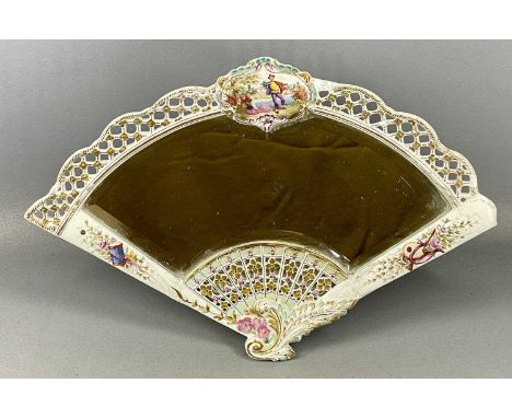 CONTINENTAL PORCELAIN FRAMED FAN SHAPED DRESSING TABLE MIRROR having a central panel painted with figures and with gilded hig