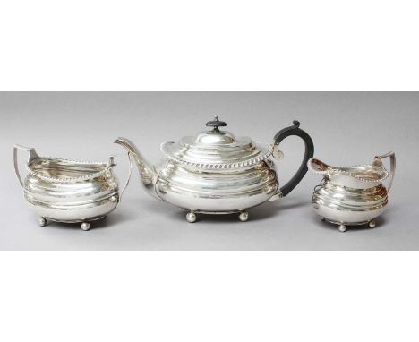 A Three-Piece Edward VIII and George V Silver Tea-Service, by Richard Woodman Burbridge, Sheffield, 1936 and 1937, Retailed b