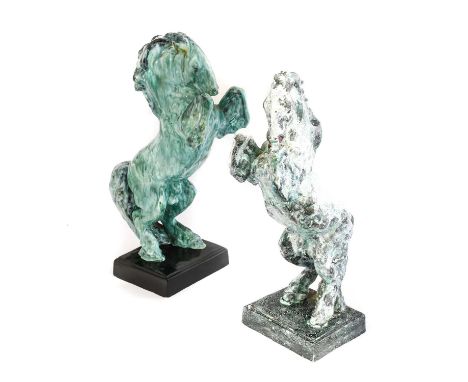 An Austrian Goldscheider Pottery Figure of a Rearing Stallion, model 5238, turquoise glaze, black base, impressed and painted