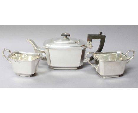 A Three-Piece George VI Silver Tea-Service, by John Turton and Co., Sheffield, 1946, tapering oblong and with canted corners,