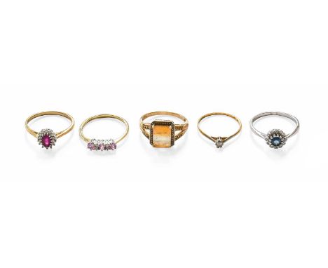 A Diamond Solitaire Ring, stamped '18CT' and 'PT', finger size R; Three 9 Carat Gold Gem-Set Rings, including a citrine examp