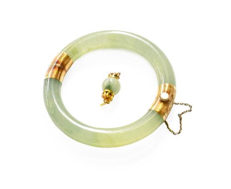A Hinged Jade Bangle, inner diameter 5.7cm; and A Jade CharmBangle - 67.1 grams. Charm - 3.4 grams.